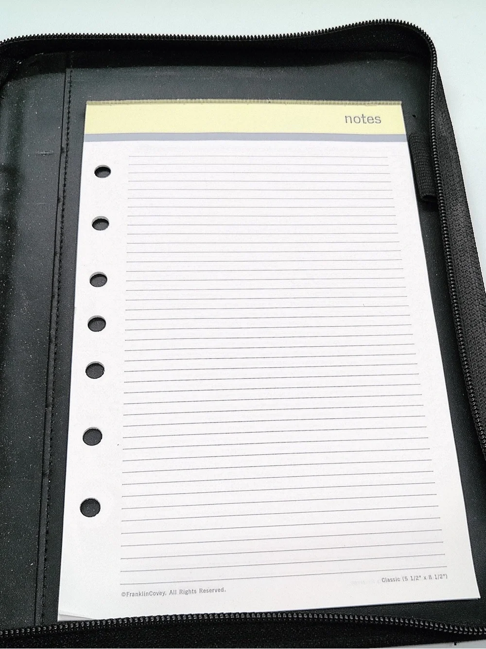 FranklinCovey 365 planner binder featuring a 7-ring binder mechanism, card slot.